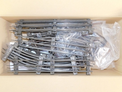 A quantity of O gauge triple rail track. (1 box)