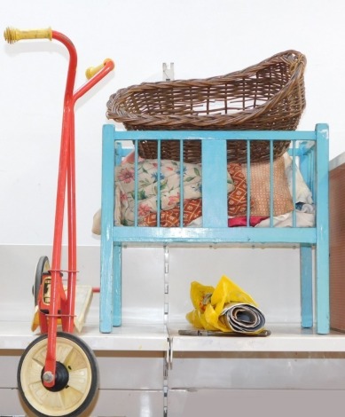 A Lew-Ways scooter, blue painted dolls crib and a Moses basket. (3)