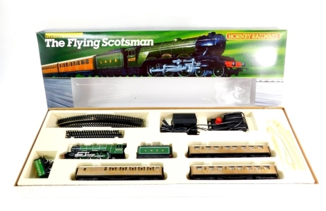 A Hornby OO gauge train set 'The Flying Scotsman', 4472 Doncaster green livery, comprising locomotive, two teak coaches, track, transformer, etc. (1)