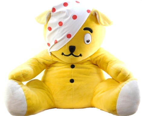 A giant Pudsey Bear, with all proceeds of sale going to BBC Children In Need - Please note there is no Buyers Premium on this lot. Dimensions approx 86cm high, 90cm wide, 63cm deep.