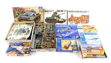 A group of Revel and other kit builds, some incomplete, to include a Hobby Boss LA7 fighter, a Tamiya T334/76, Matchbox HE7OF, Airfix Mustang, Spitfire MK1, Revel HE70, Revel Lovochkin, and others. (1 box)