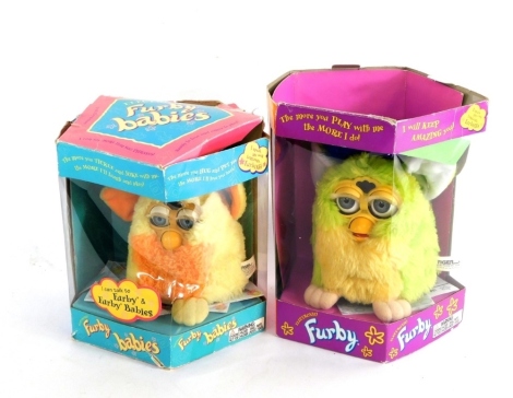 Two Furby babies, boxed.