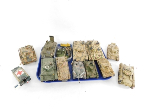 A group of kit built tanks, with armored painted detailing, die cast army vehicles, etc. (1 tray and 3 tanks)