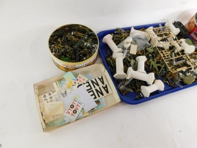 A group of painted plastic army figures. (3 tins) - 3