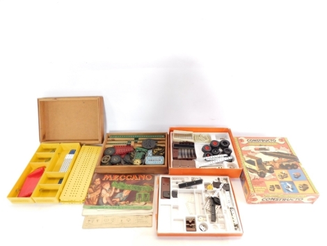 A group of Meccano and Constructo, a Meccano outfit number 4 with instruction manual in wooden box, yellow loose Meccano box, and a big truck construction set. (3)