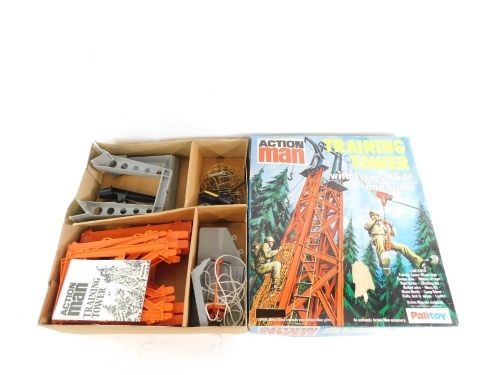 A Palitoy Action Man training tower, with escape slide and crane, boxed.