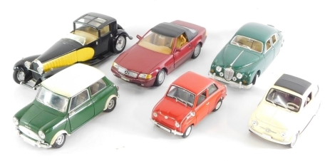 Solido, Maisto and Revell 1:18 scale die cast vehicles, including Jaguar MKII, Fiat 500, Mini Cooper, etc. (6)