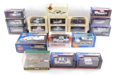 A group of police cars, to include The Corgi Police Car Vehicle set, on stand., Corgi 999 Series., Crimestoppers die cast cars, etc. (1 tray and 1 shelf)