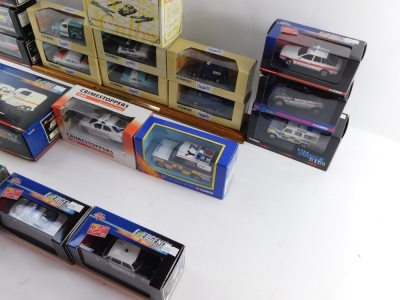 A group of police cars, to include The Corgi Police Car Vehicle set, on stand., Corgi 999 Series., Crimestoppers die cast cars, etc. (1 tray and 1 shelf) - 2