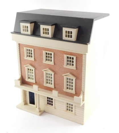 An Elizabethan style town house doll's house, with a brick frontage, two storeys.