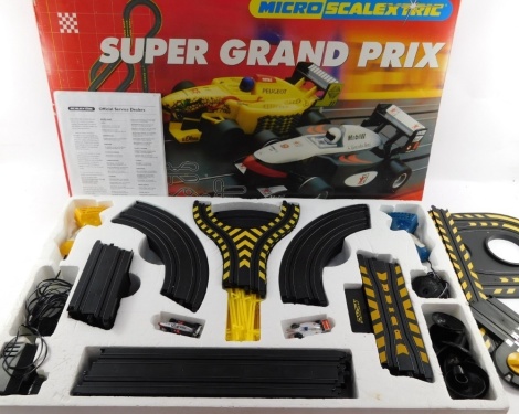 A Micro Scalextric Super Grand Prix cased set, boxed.