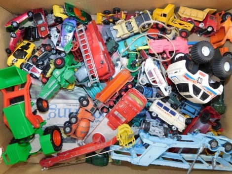 Dinky and other die cast vehicles, fire engines, cement mixers, agricultural vehicles, etc, play worn. (1 box)