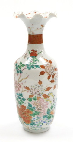 A Taisho period Japanese Kutani baluster vase, decorated in floral enamels, signed, 33cm high. (AF)