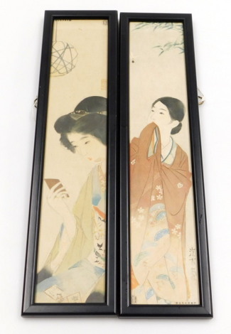 A pair of Japanese colour prints, depicting ladies in traditional costume, 35cm x 6.5cm.