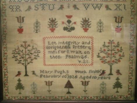 A framed 19thC sampler by Mary Pugh