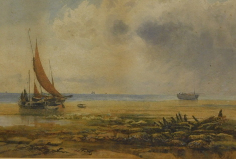 •John Carlisle (b.1834). Seascape, boats drying sails on a shore with clouds gathering, watercolour, signed and dated 1874, 24cm x 38cm.