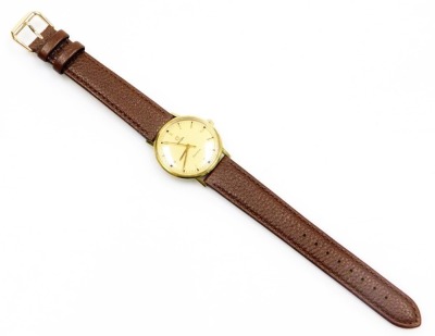 An Omega Geneve gentleman's wristwatch, with a circular dial in a gold plated and stainless steel case, circa 1969, on a later leather strap, the dial 3cm wide. - 2