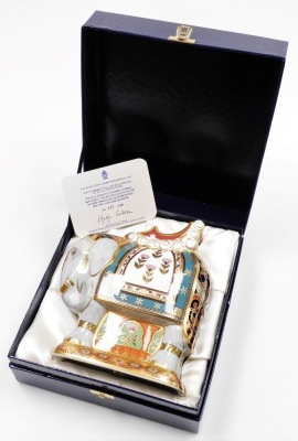 A Royal Crown Derby Mulberry Hall Indian Elephant porcelain paperweight, limited edition number 457/500, with gold stopper and red printed mark to underside, 22cm high, boxed, with certificate.