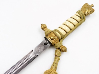 A German Third Reich Kriegsmarine officers dagger, with scabbard and engraved blade, stamped Paul Weyersberg & Co, 42cm long overall. - 3