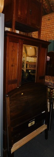 An Edwardian mahogany single wardrobe, together with two Staples headboards and an Edwardian piano stool. (4)