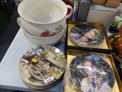 A group of collectors plates and two chamber pots.