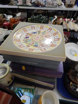 A group of boxed Wedgwood collectors plates.