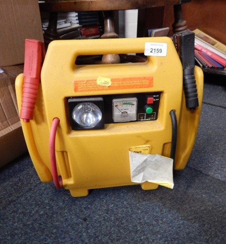 A Rolson twelve volt jump start with air compressor.