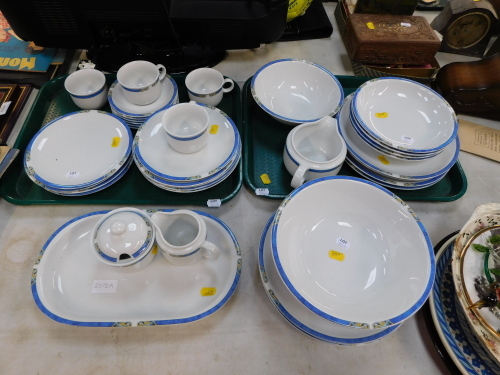 A Seltman Weinden Bavarian part dinner service, white with Art Deco blue stripe pattern, to include dinner plates, bowls (one AF), milk jug, lidded sugar bowl, serving plate, etc. (2 trays plus)