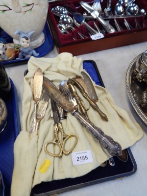 Silver plated wares, set of silver plated teaspoons, silver plated carving knife, fish slices, brass nutcracker, etc. (a quantity)