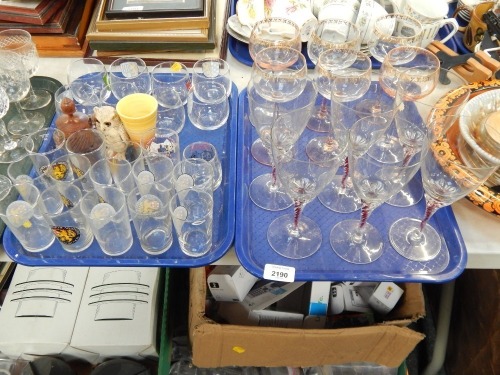 A group of glassware, a set of six modern wine glasses with twist stem, tumblers, etc. (4 trays)