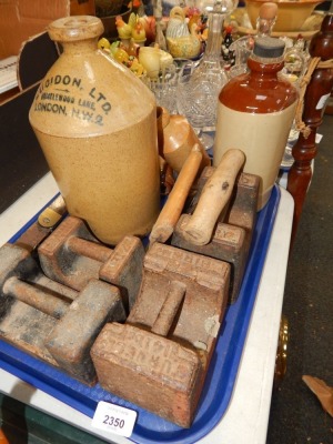 A group of stoneware bottles, Avery weights, sock darning mushrooms, etc. (1 tray)