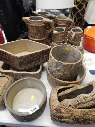 A group of log finish stoneware, jugs and planters, including Hillstonia. (a quantity)