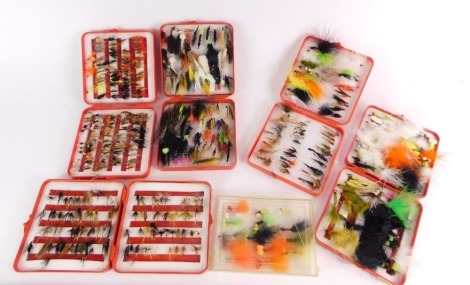 A collection of trout fishing flies, mainly lures, contained in five Leeda fly cases, and another.