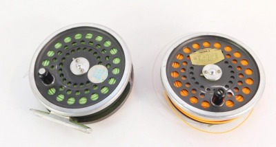 An Olympic Model 460 fly fishing reel, with spare spool, and two