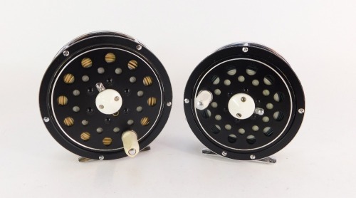 Two Olympic fly fishing reels, comprising Model 460 and Model 440, together with two fly lines.