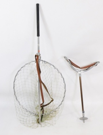 A Gye alloy landing net, 60cm diameter, and an Eldonian folding shooting stick. (2)