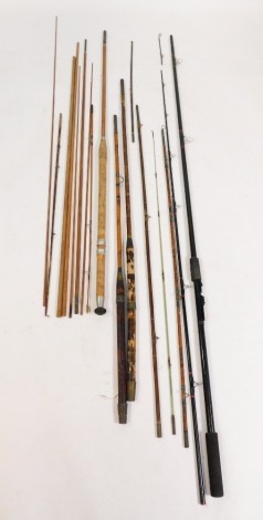 A group of sanded and stripped split cane rods, North Western glass fibre float rod, etc.