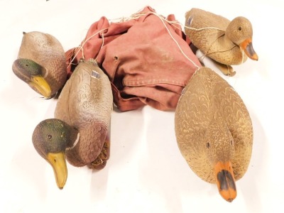 Four Mallard Sport Plast decoy ducks.