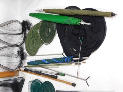 Two folding trout landing nets, and three keep nets, (two are illegal, display purposes only), together with fishing accessories, to include umbrellas and bank sticks, etc, wading stick, rod tube, landing net, etc. (a quantity) - 2