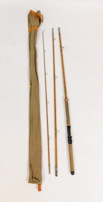 A Sealey Octafloat deluxe split cane fishing rod, 12ft, in canvas carry bag.