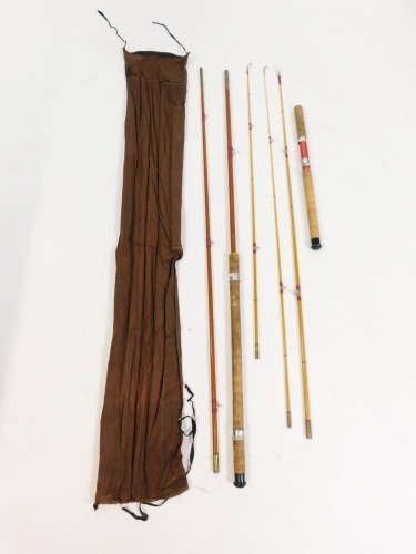 A six piece cane and fibre glass rod.