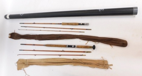 An Auger Moy three piece split cane fly rod, #5, 9ft 6", with canvas bag, another three piece split cane fly rod, with a plastic rod tube. (4)