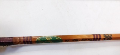 An Auger Moy three piece split cane fly rod, #5, 9ft 6", with canvas bag, another three piece split cane fly rod, with a plastic rod tube. (4) - 3