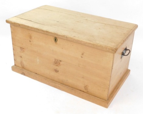 A 19thC pine blanket box, with cast iron carrying handles, 50cm high, 94cm wide, 53cm deep.