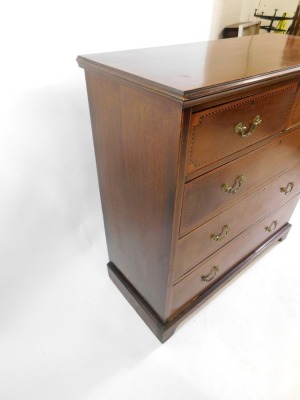 An Edwardian mahogany and barber's pole inlaid chest, of two short over three long graduated drawers, raised on bracket feet, 110cm high, 107cm wide, 47.5cm deep. - 3