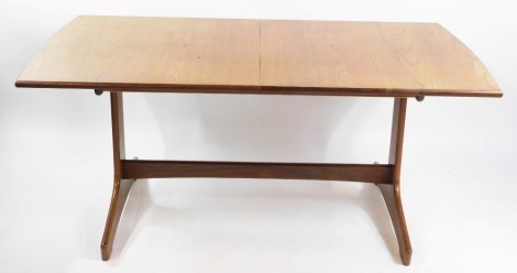 A Vanson 1960's teak draw leaf dining table, with one additional leaf, raised on shaped end supports, united by a straight stretcher, 71cm high, 156cm wide, 190cm extended, 86cm deep.