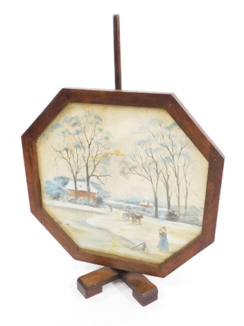 An early 20thC oak framed fire screen, of octagonal form, set with a painting of a winter landscape, raised on an X frame base, 108cm high, 78cm wide.