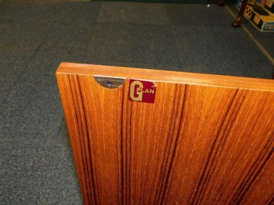 A G-Plan 1960's teak lounge unit, the two section top with an arrangement of five shelves and a drop down drinks cabinet, above a sideboard base with four doors, raised on a plinth base, 198cm high, 162.5cm wide, 46cm deep. - 3