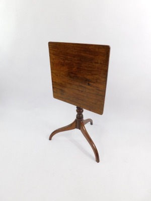 A George III mahogany tilt top occasional table, the rectangular top raised on a turned column above three scrolling legs, 70cm high, 52cm wide, 51cm deep. - 3