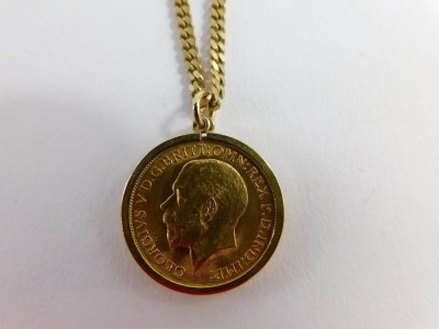 A George V full gold sovereign pendant and chain, dated 1912, on curb link chain marked 9ct, 60cm long, 22.1g all in. - 3